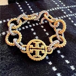 Tory Burch gold and silver rope chain link bracelet.